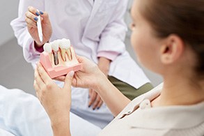 A woman at a dental implant consultation