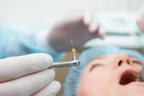 A patient having dental implant surgery