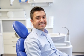 Male dental patient smiling after receiving dental crown in Salinas, CA