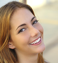 woman smiling sweetly