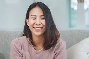 Young woman smiling after wisdom tooth extraction in Salinas, CA