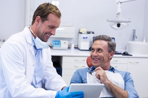 Patient talking to a dentist